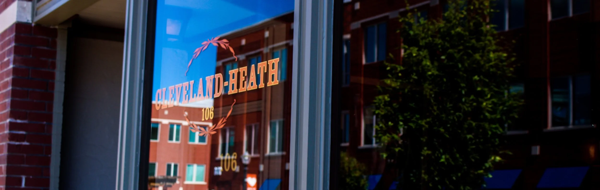 The Cleveland-Heath wordmark etched on the front window